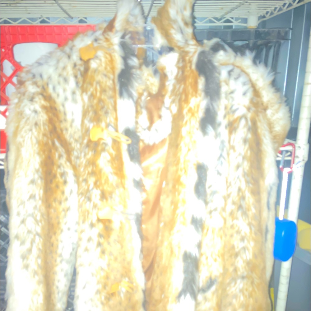 Pamela McCoy faux fur coat